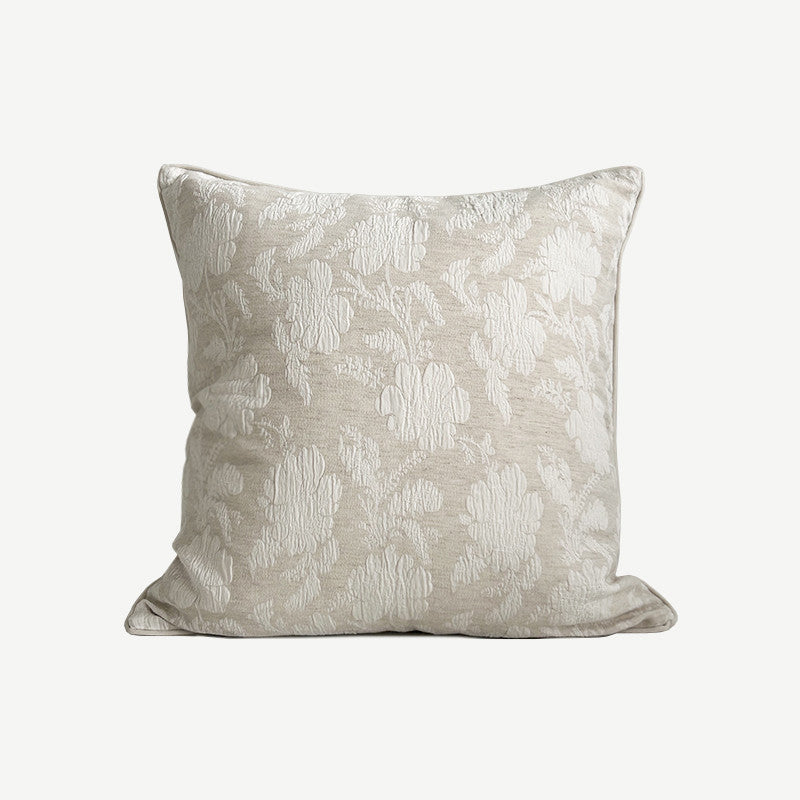 Decorative pillow with a subtle pattern on a white background