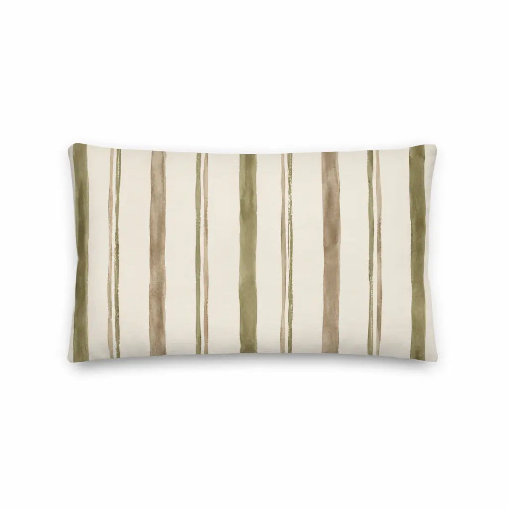 Striped pillow with green and beige pattern on a white background