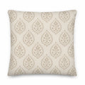 Decorative pillow with a leaf pattern on a beige background
