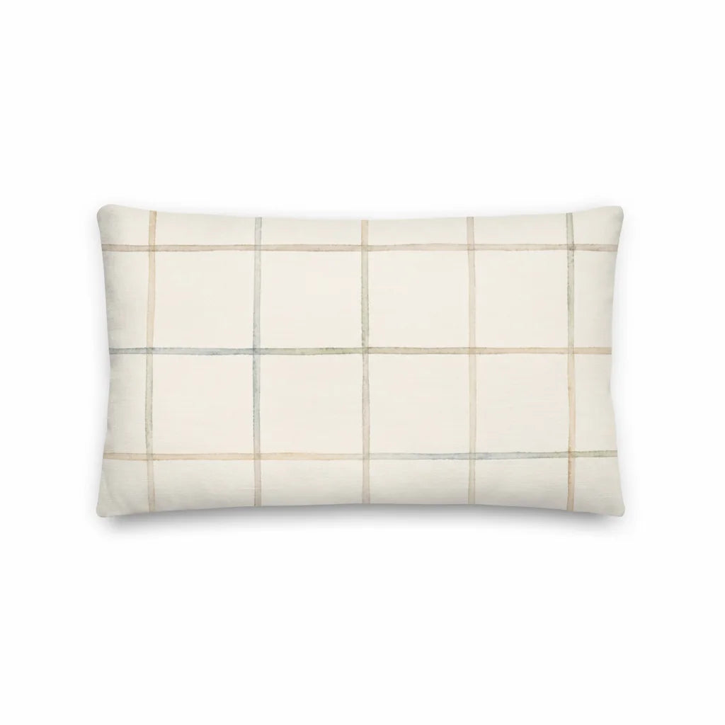 Rectangular pillow with a beige and white checkered pattern on a white background